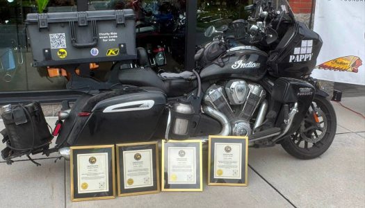 Indian owner sets four world records after 201,901-mile charity ride