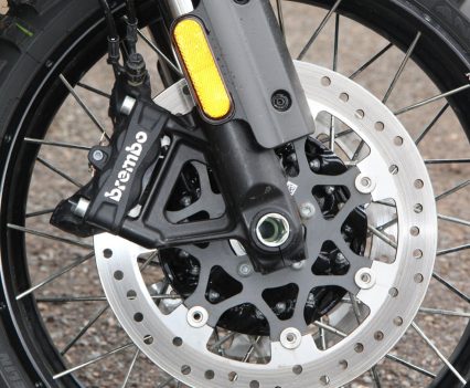 Twin 320mm rotors and four-piston Brembo calipers provide the front stopping power.