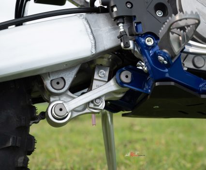 The linkage gives the KYB rear suspension a progressive response as it compresses.