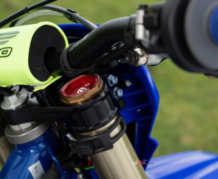 Top-mounted KYB fork adjusters allow riders to fine-tune the suspension.